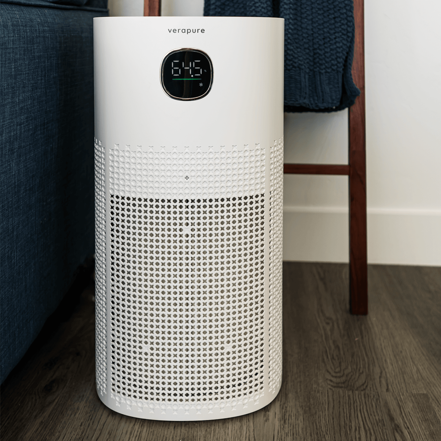 VP-300-WI air purifier operating by a couch in a livingroom